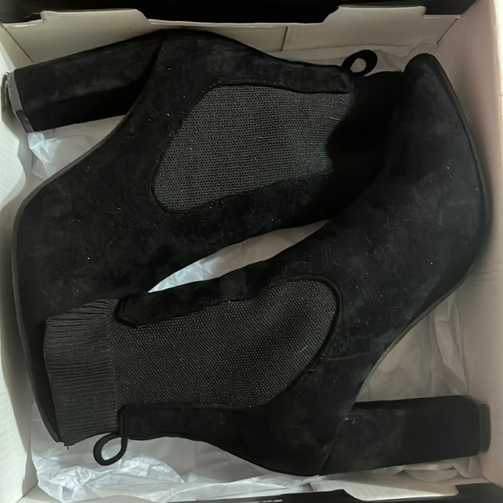 Black booties size 5.5. Fits closer to a size 6